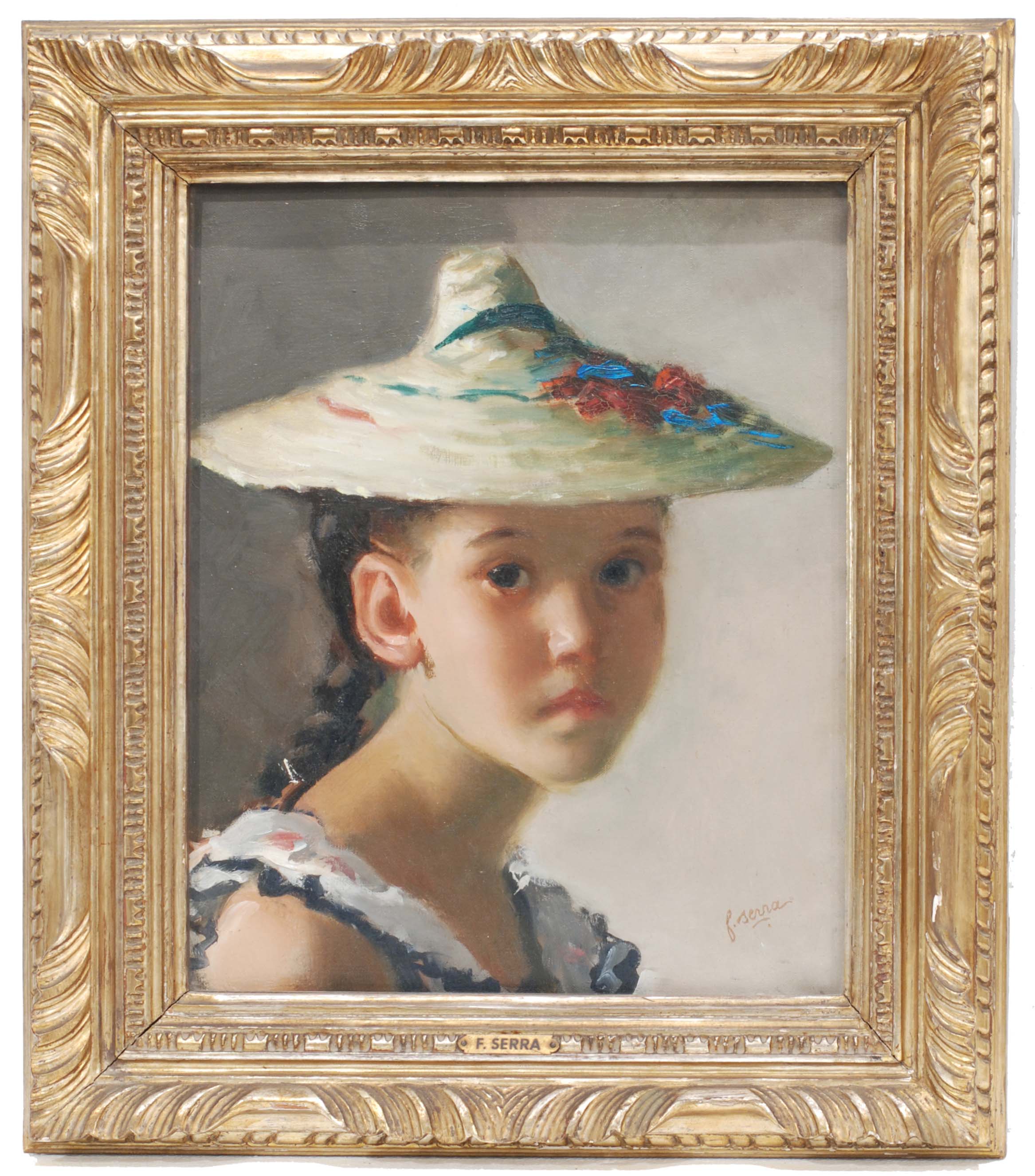 "Retrato niña con sombrero".