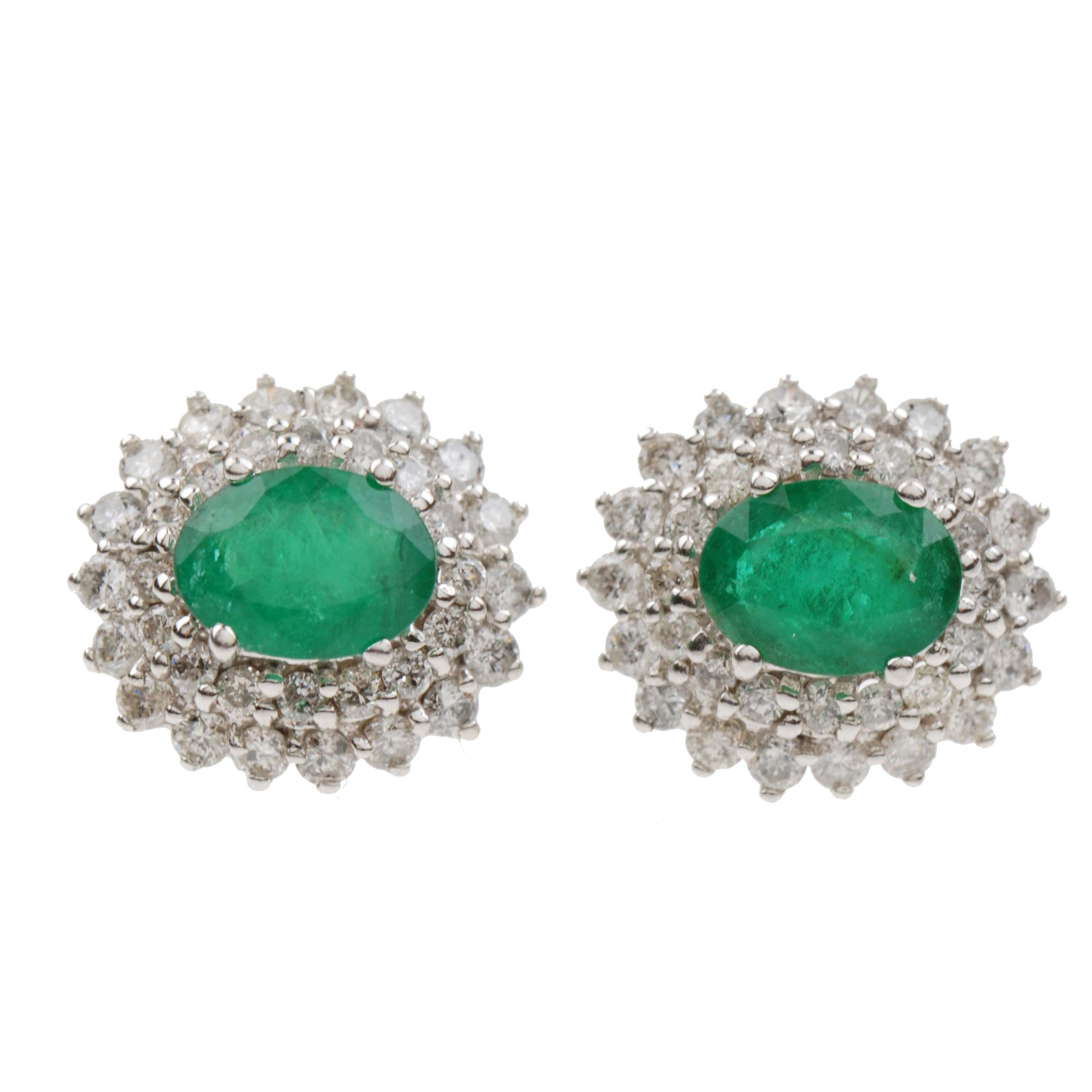 HALO EARRINGS WITH EMERALD AND DIAMONDS.