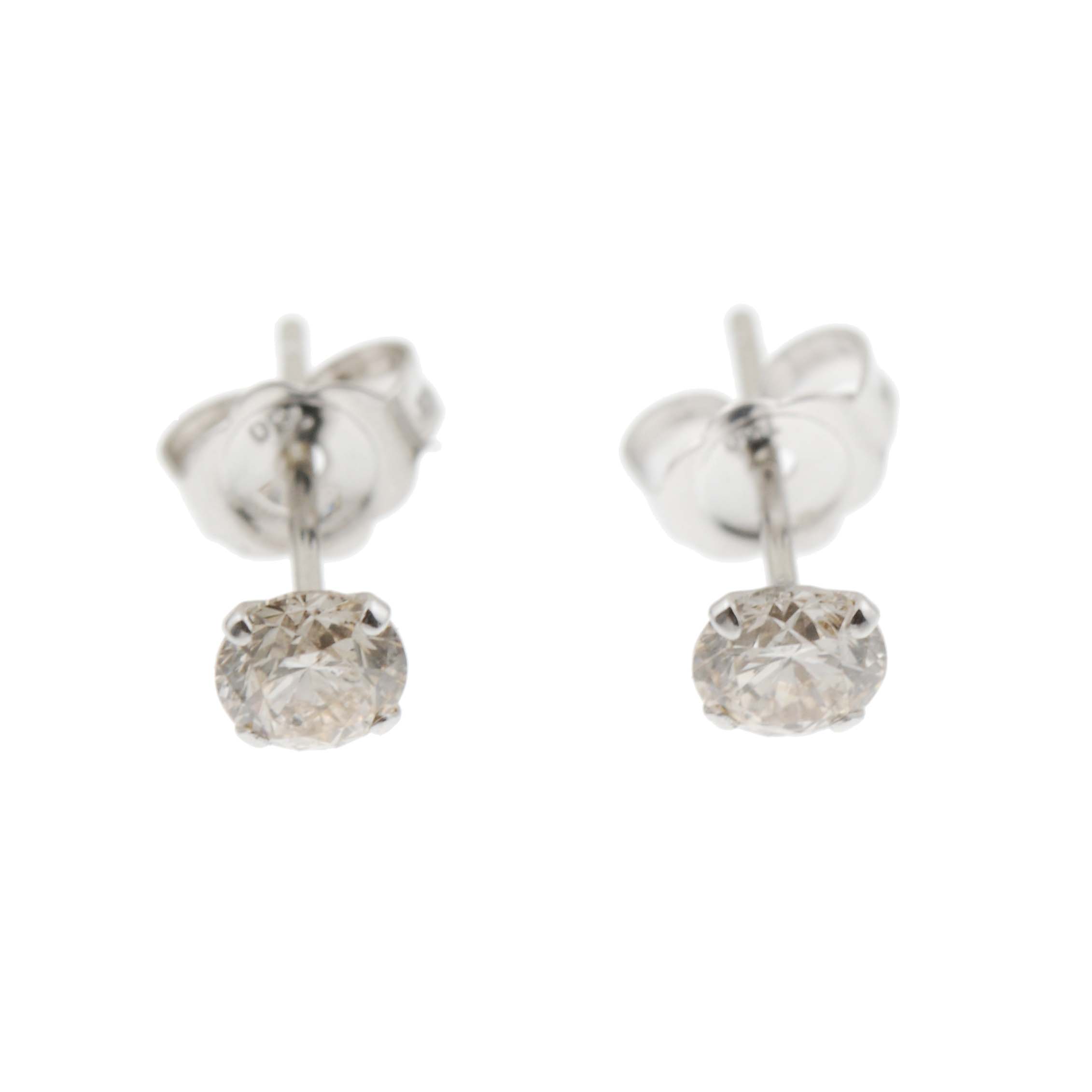 DIAMOND STUD EARRINGS.