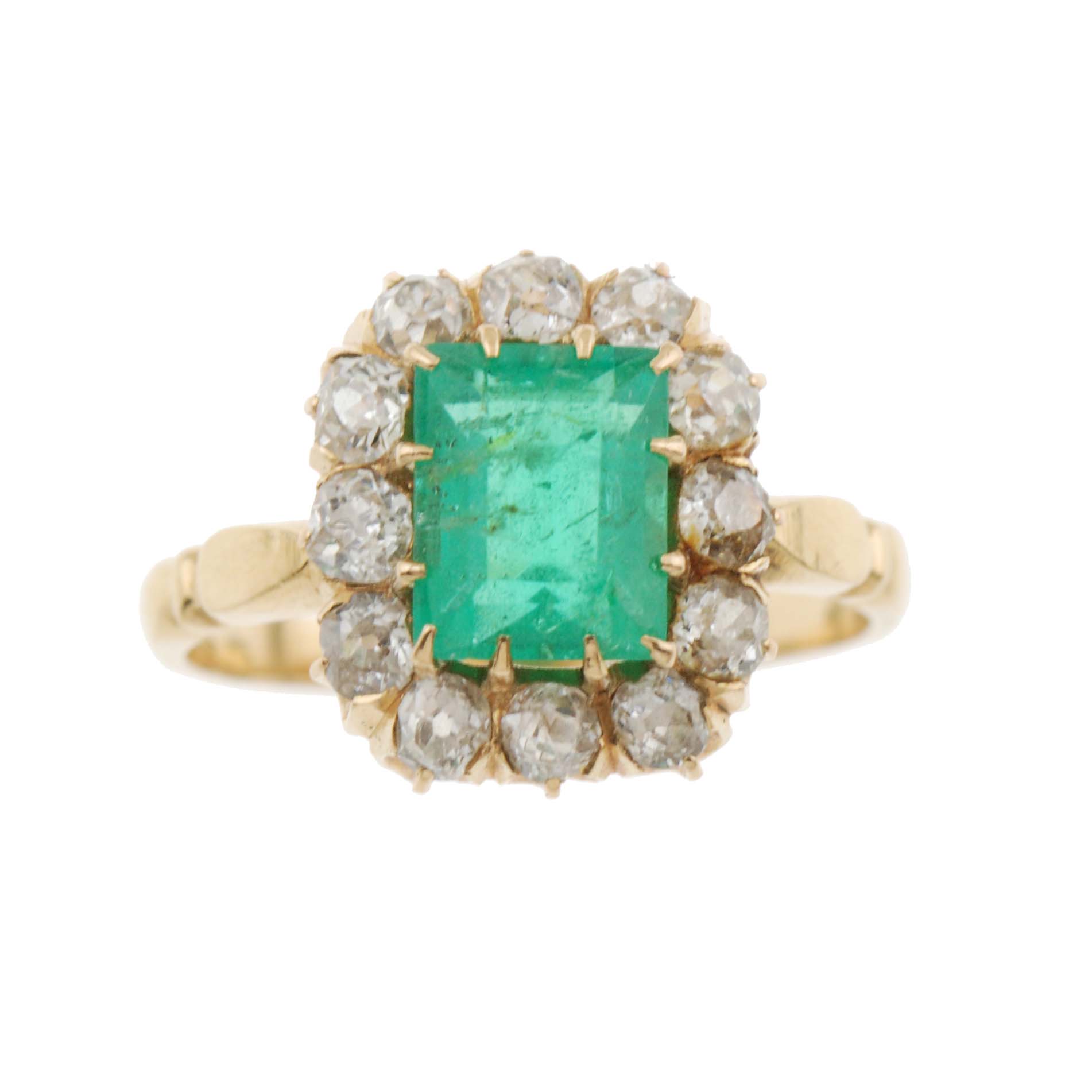 DIAMOND AND EMERALD ROSETTE RING. 