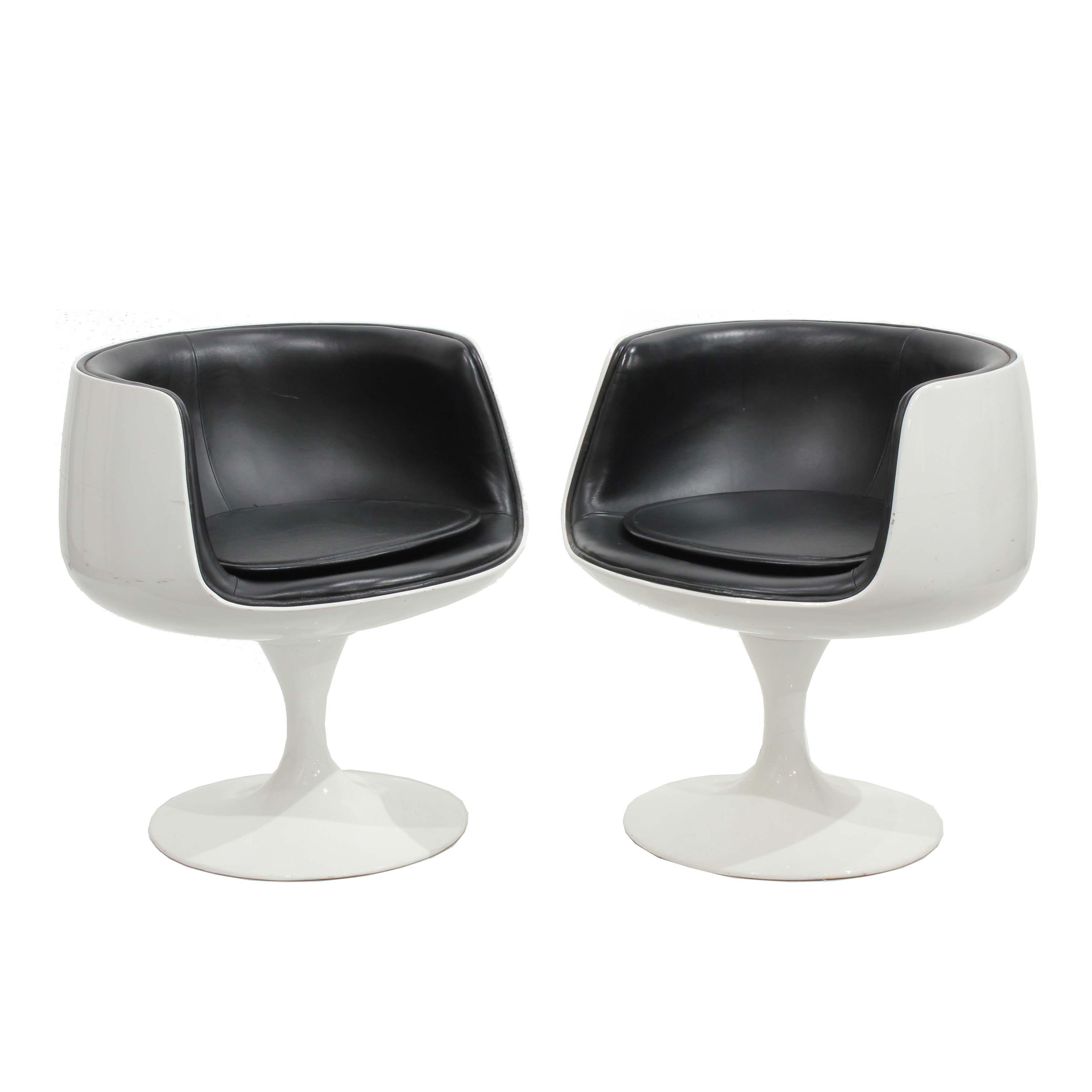 AFTER MODELS OF EERO AARNIO (1932). PAIR OF "COGNAC CHAIRS"