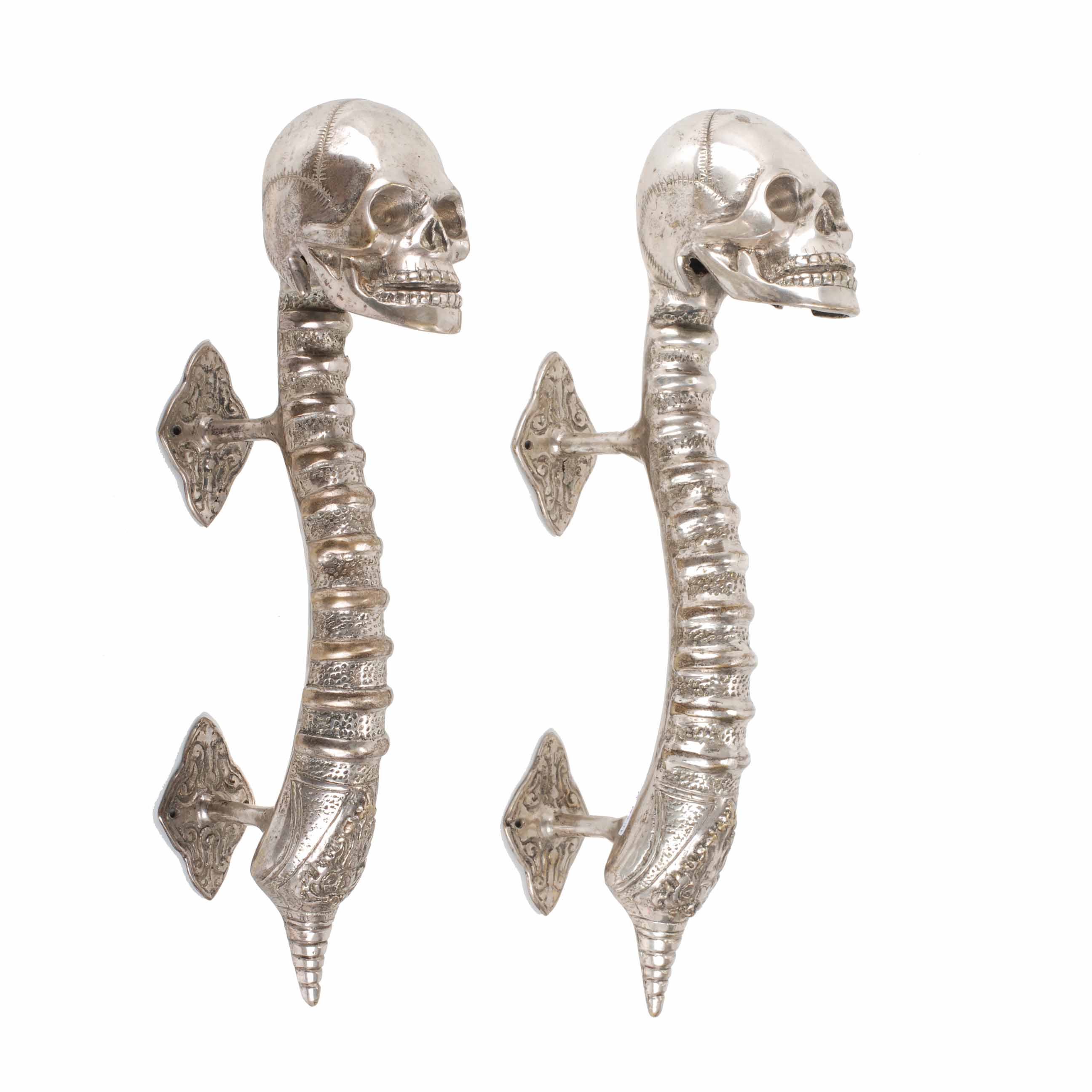 PAIR OF SKULL-SHAPED DOOR HANDLES, MID 20TH CENTURY.