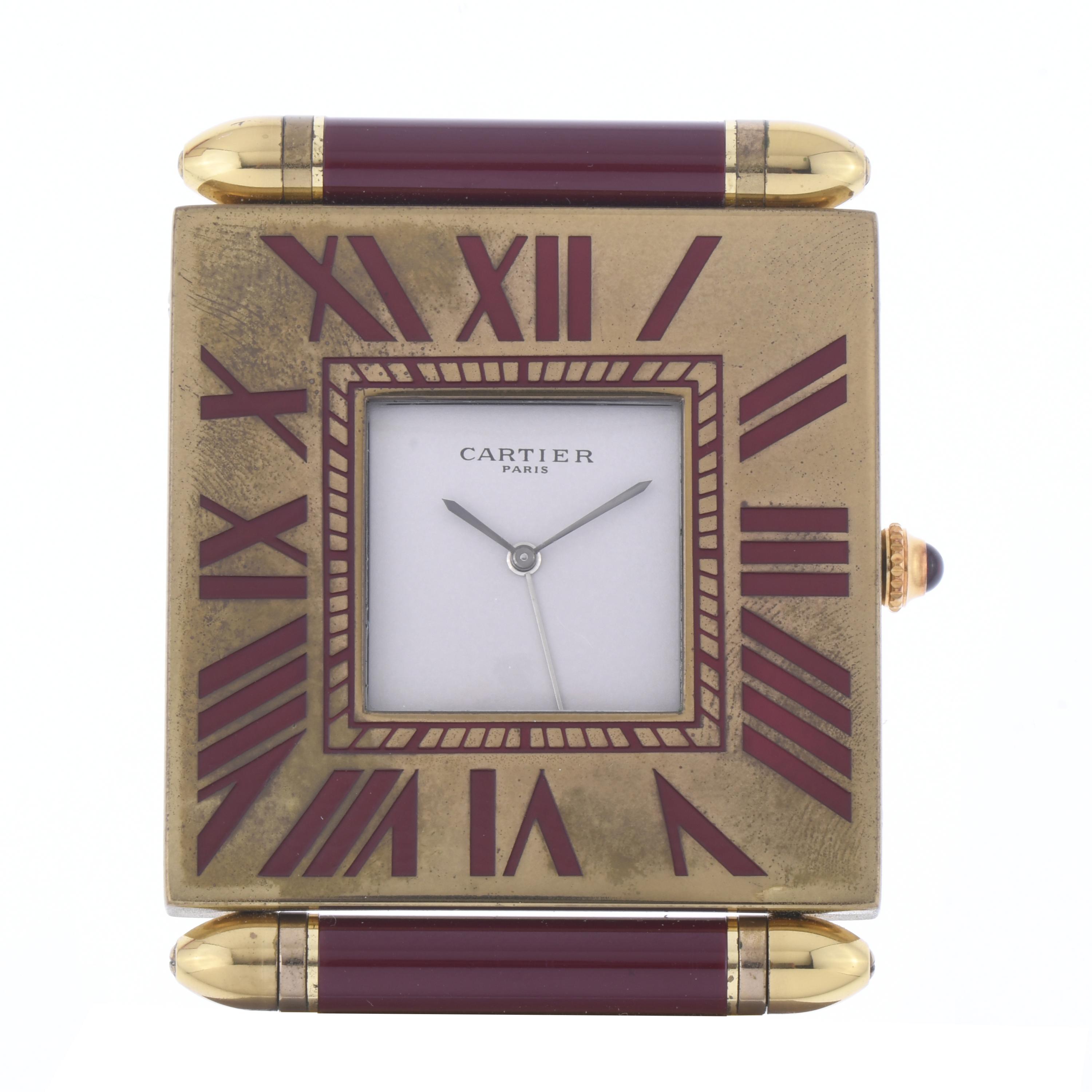 CARTIER. TRAVEL ALARM CLOCK, 20TH CENTURY. 