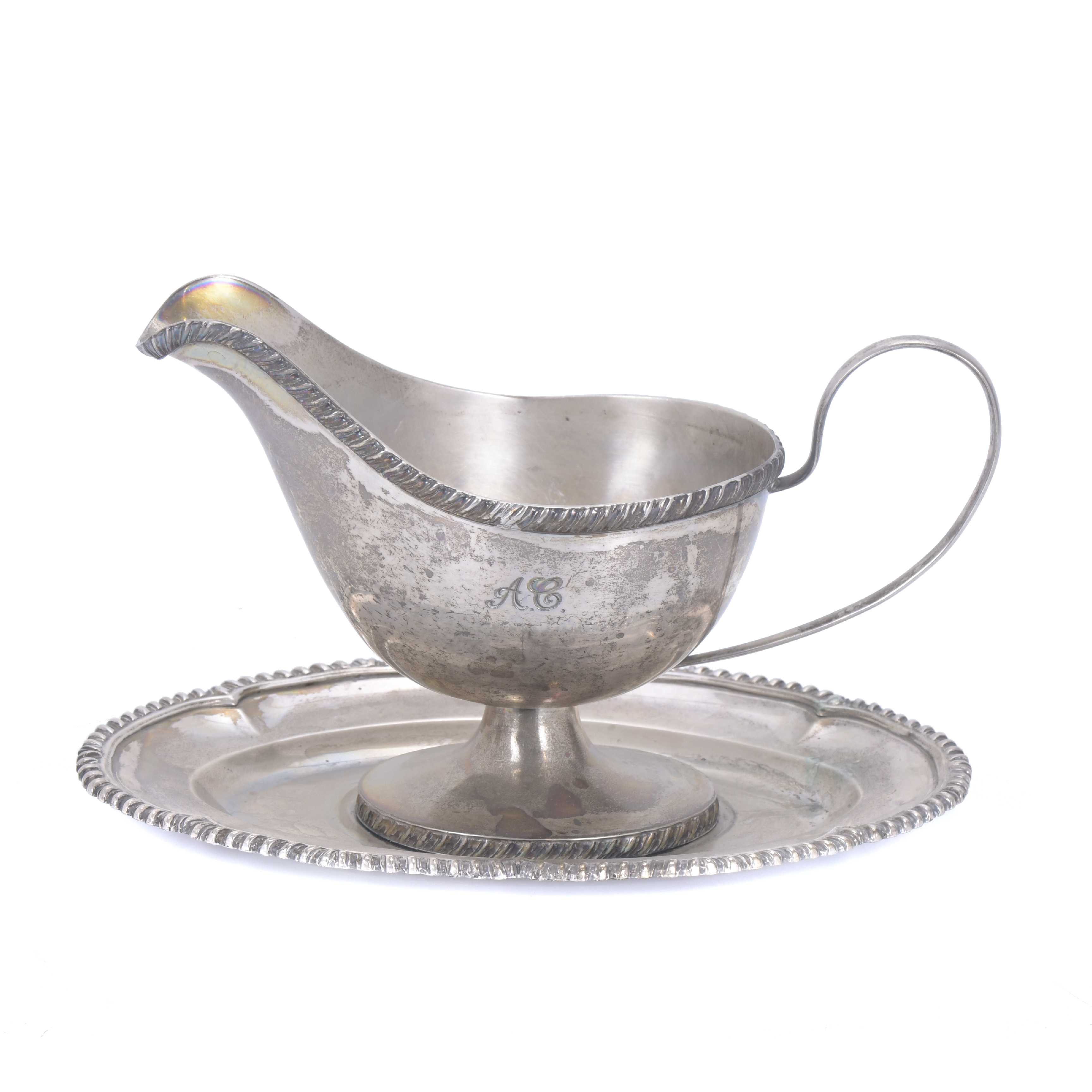 SILVER SAUCE BOAT ON PLATTER, 20TH CENTURY.