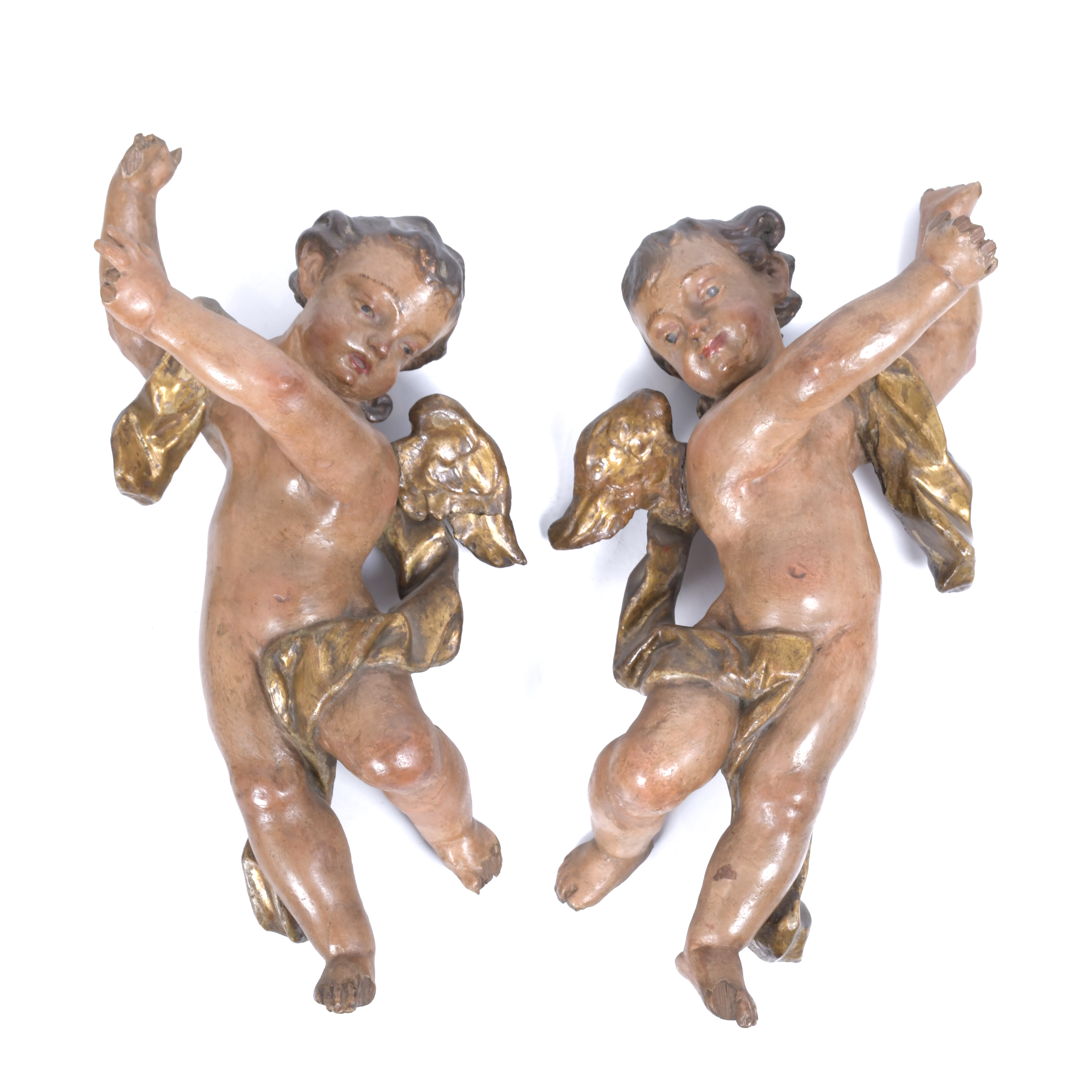 PAIR OF PUTTI IN POLYCHROME CARVING, MID 20TH CENTURY.