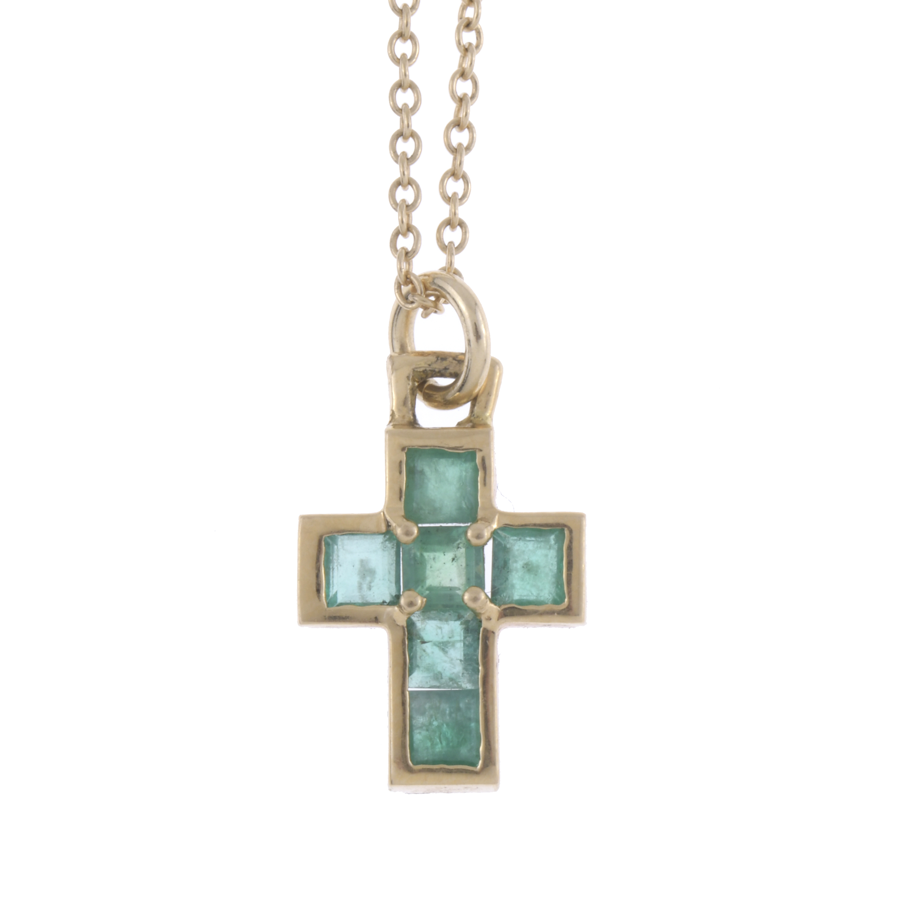 EMERALDS CROSS PENDANT.