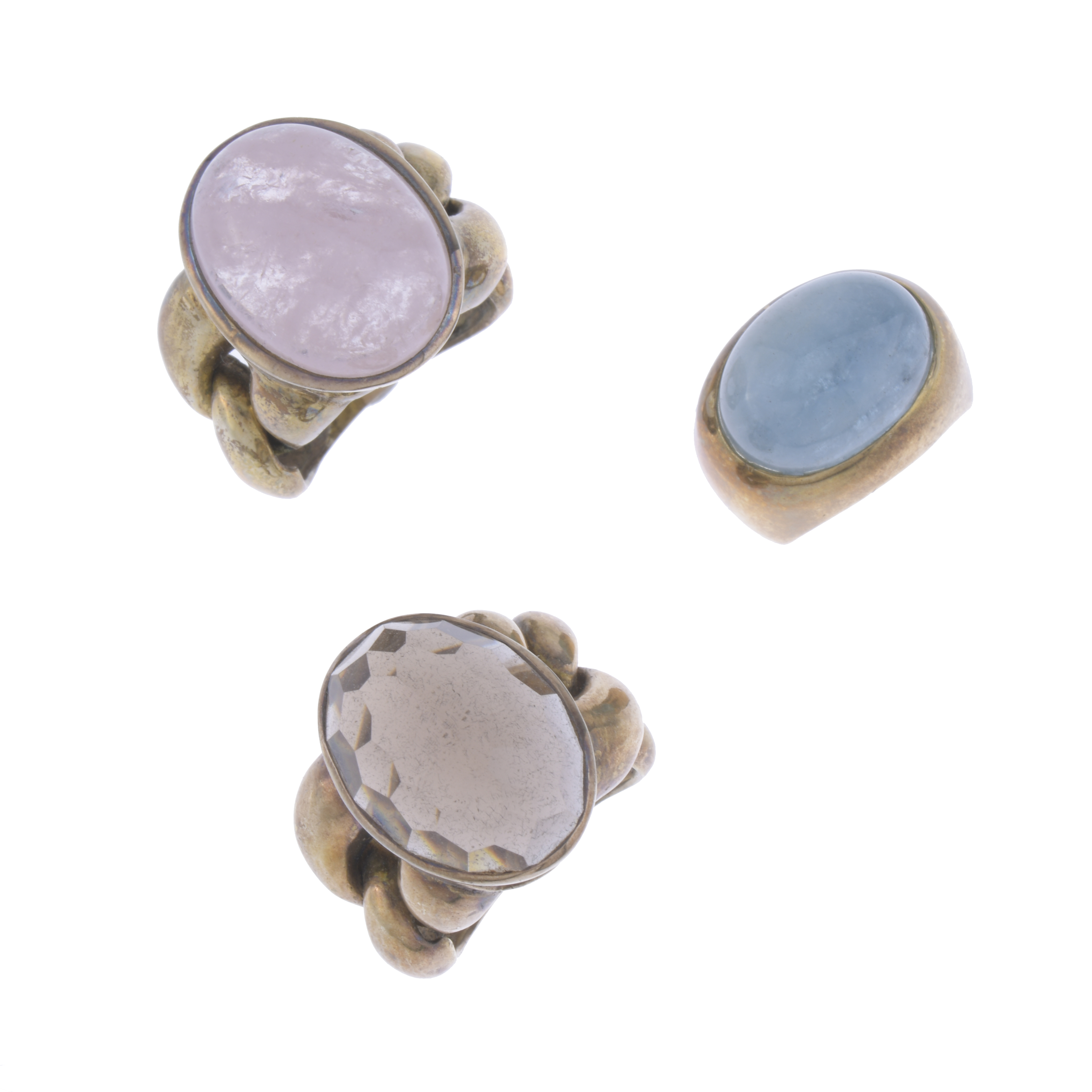 THREE NATURAL STONE RINGS.