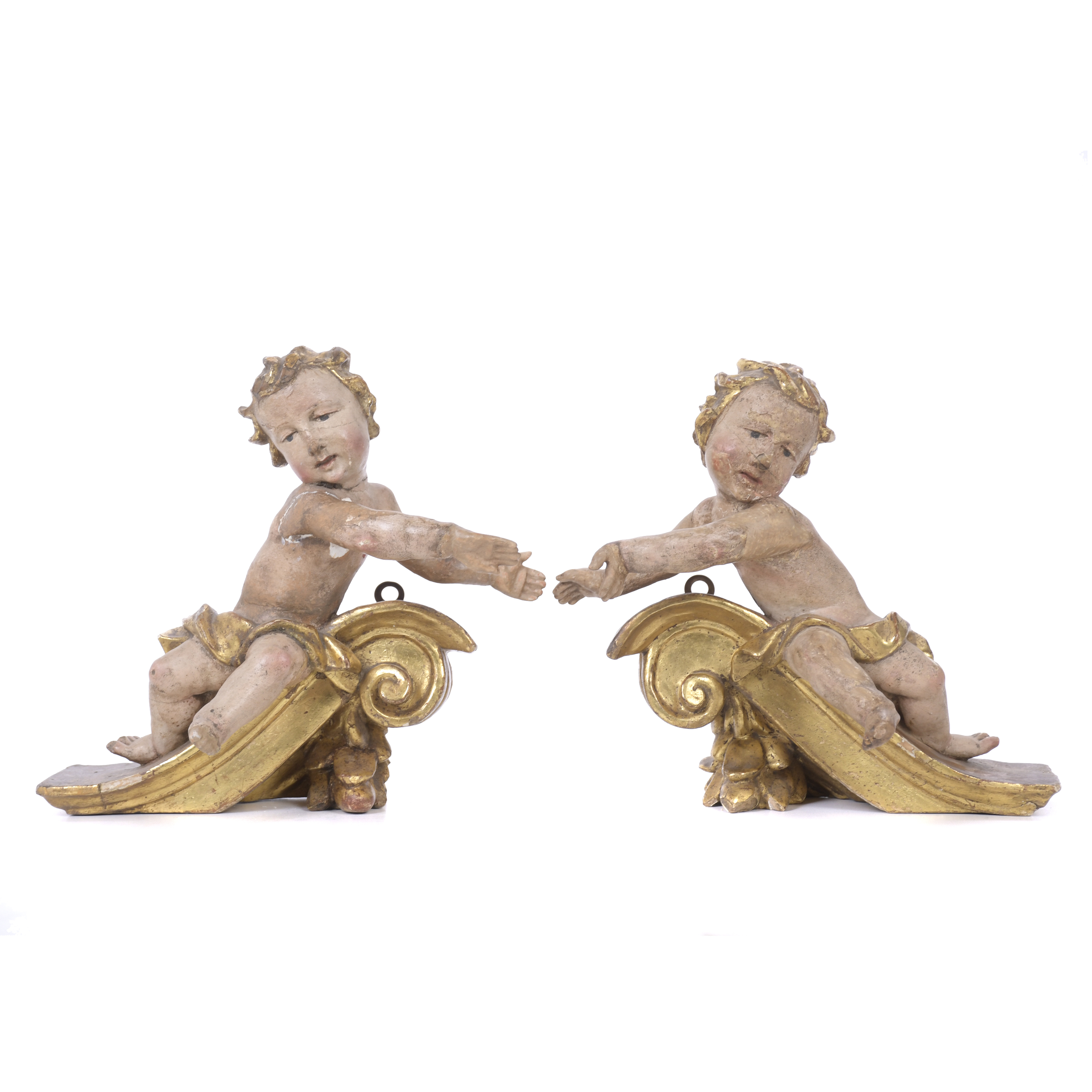 PAIR OF CRESTS WITH FIGURES OF ANGELS, 19TH CENTURY.