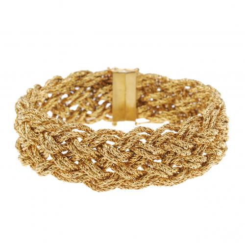 PULSERA TRENZADA EN ORO.