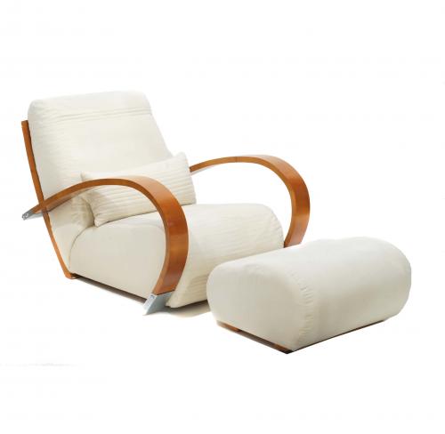 Armchair and footrest in light walnut wood with metal fittings in shiny nickel. Upholstery in velveteen.Designed by Jaume Tresserra and produced in Spain by Tresserra Design around 1987.76 x 80,5 x 103 cm. armchair.