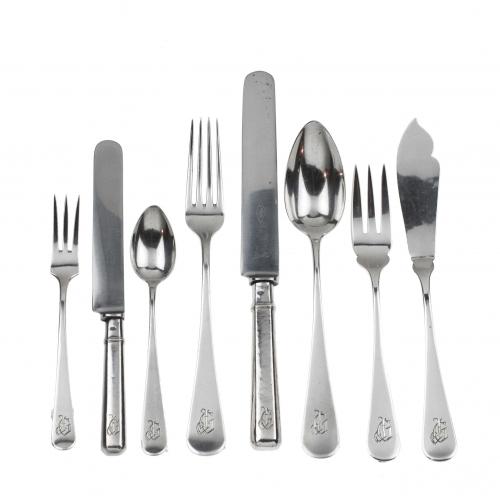 Hallmarked, engraved with the initials J.G.It comprises 90 pieces of table cutlery and 4 serving items. Total 94 pieces.3.513 kgs. of weight, without knives. 