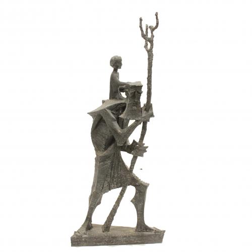 Bronze sculpture of St. Christopher with Jesus Child in his arms.Signed and dated on the lower left corner, 1961.93 x 39 x 17 cms.