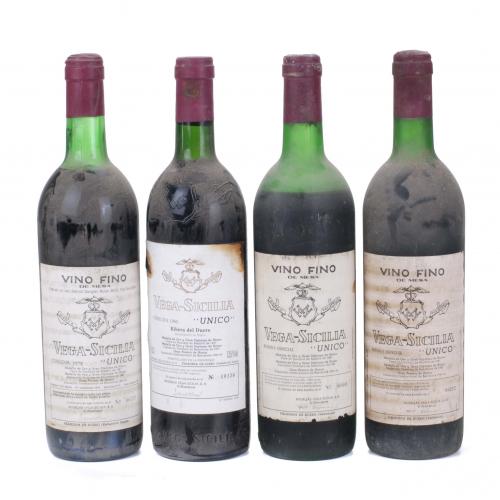 CUATRO BOTELLAS DE VINO FINO VEGA-SICILIA "UNICO", 1962, 1972, 1979 Y 1980.