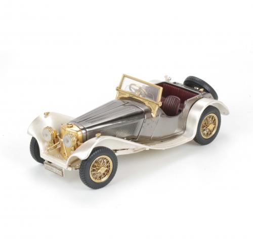 MINIATURA DE JAGUAR SS 100 A ESCALA, MONTADO EN PLATA.