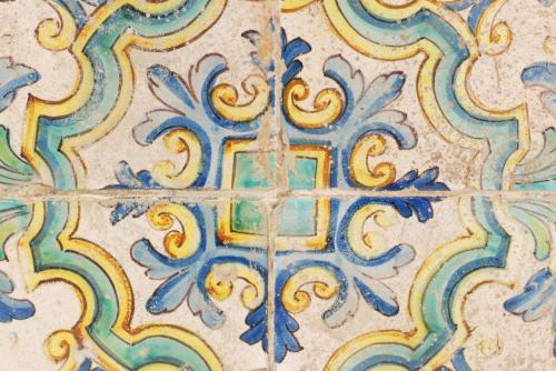 PANEL OF FOUR CATALAN "SAMPLE" TILES, 18TH CENTURY.