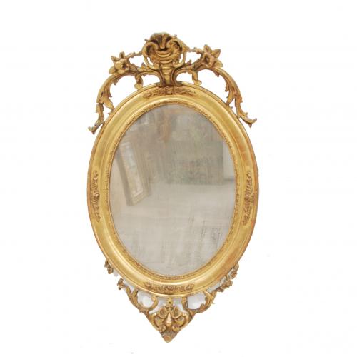 SPANISH OVAL MIRROR, C19th.