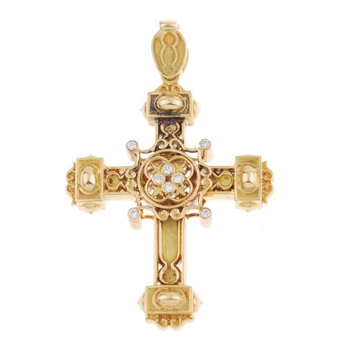 GOLD AND DIAMOND CROSS PENDANT .