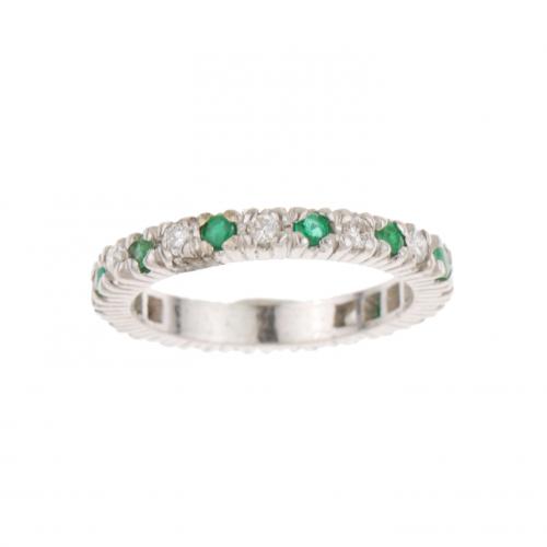 DIAMOND AND EMERALD WEDDING RING.