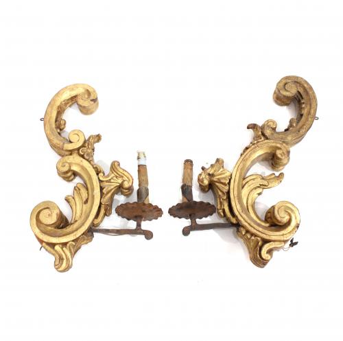 PAIR OF ORNAMENTAL  BAROQUE CARVINGS CONVERTED INTO WALL  LIGHTS.