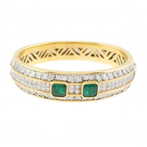 DIAMOND AND EMERALD SLAVE BRACELET.