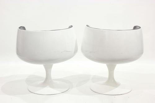 AFTER MODELS OF EERO AARNIO (1932). PAIR OF "COGNAC CHAIRS"