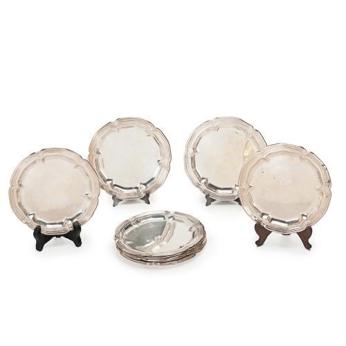 SET OF TWELVE SPANISH SILVER SIDE PLATES, C20th.