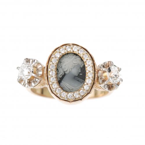 CAMEO RING SURROUNDED BY DIAMONDS.