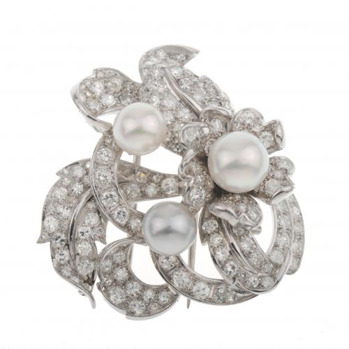 DIAMONDS AND PEARLS FLOWER BROOCH.