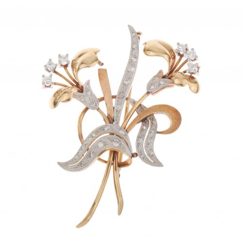 YELLOW AND WHITE GOLD BROOCH.