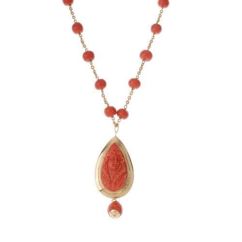 CORAL BEADS AND GOLD LONG NECKLACE.