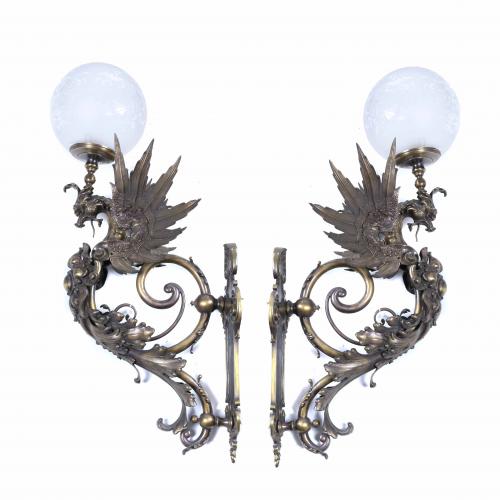 PAIR OF MODERNIST LARGE WALL LAMPS IN THE SHAPE OF DRAGONS, EARLY 20TH CENTURY.