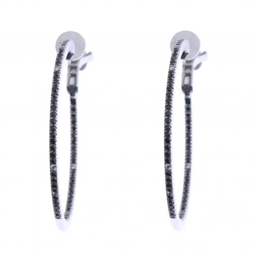 CREOLE EARRINGS WITH BLACK AND WHITE DIAMONDS.