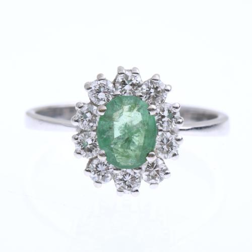 RING WITH DIAMONDS AND CENTRAL EMERALD.