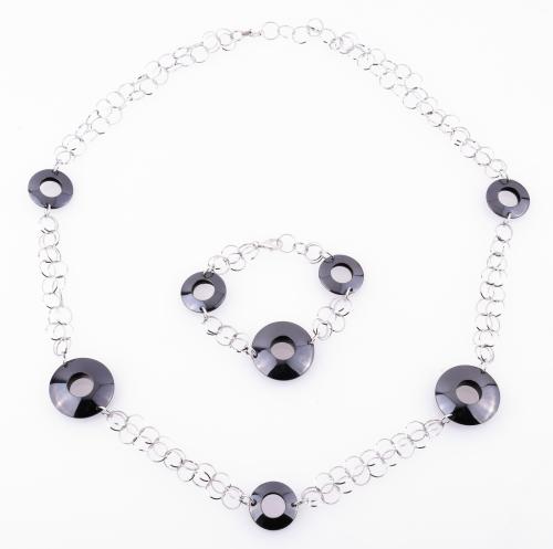 JUEGO DE COLLAR Y PULSERA EN PLATA .