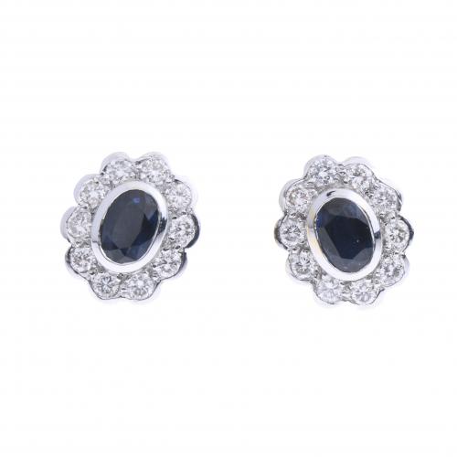 SAPPHIRES AND DIAMONDS ROSETTE EARRINGS.