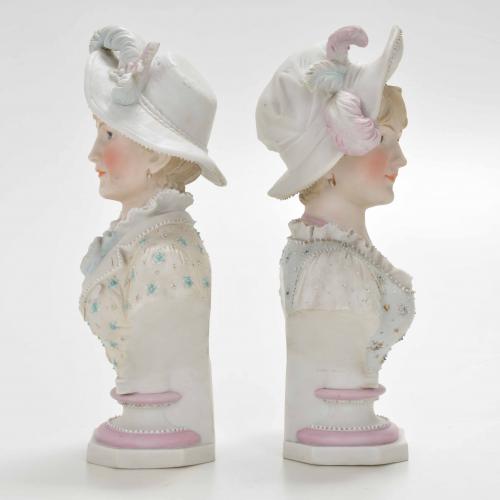 "GIRLS", PAIR OF SÉVRES-STYLE FRENCH BUSTS.