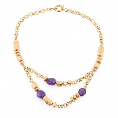 ETHNIC STYLE NECKLACE IN YELLOW GOLD WITH AMETHYSTS.