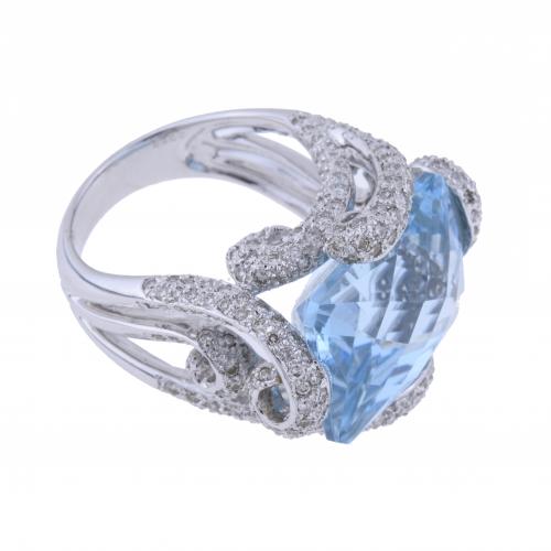 BLUE TOPAZ AND DIAMONDS LARGE RING.