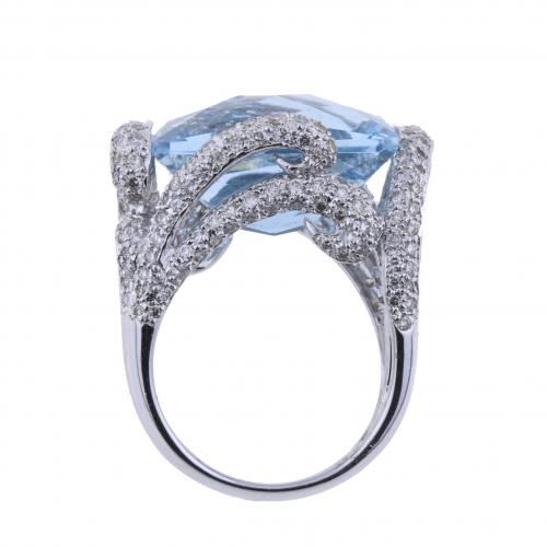 BLUE TOPAZ AND DIAMONDS LARGE RING.