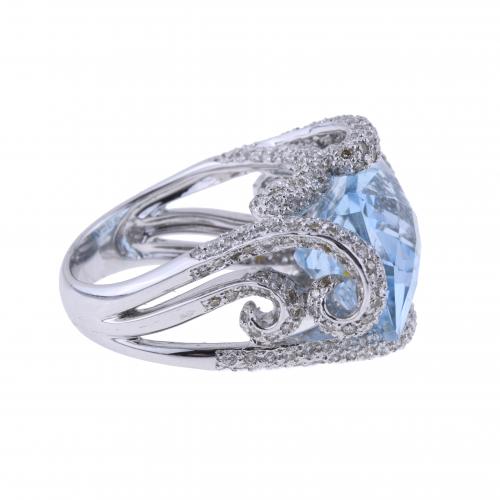 BLUE TOPAZ AND DIAMONDS LARGE RING.