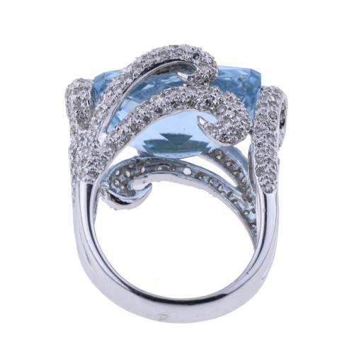 BLUE TOPAZ AND DIAMONDS LARGE RING.