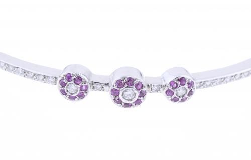 BRACELET WITH DIAMONDS AND ROSE SAPPHIRES FLOWERS.