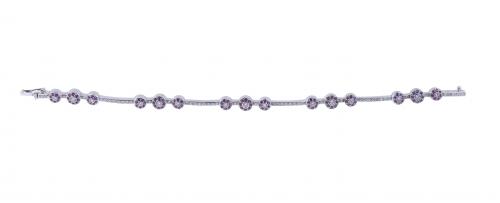 BRACELET WITH DIAMONDS AND ROSE SAPPHIRES FLOWERS.