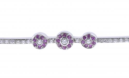 BRACELET WITH DIAMONDS AND ROSE SAPPHIRES FLOWERS.