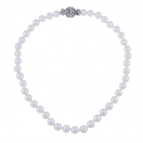 PEARLS NECKLACE WITH DIAMONDS CLASP.