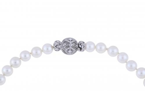 PEARLS NECKLACE WITH DIAMONDS CLASP.