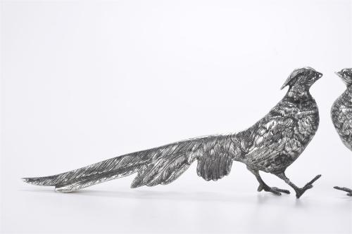 SPANISH DOVE AND PHEASANT IN SILVER, MID 20TH CENTURY.