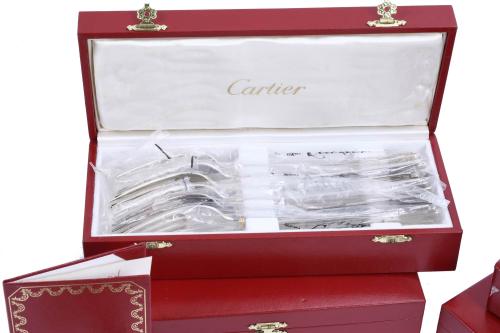 CARTIER. TWELVE-SERVICE CUTLERY SET, "LA MAISON DE LOUIS CA