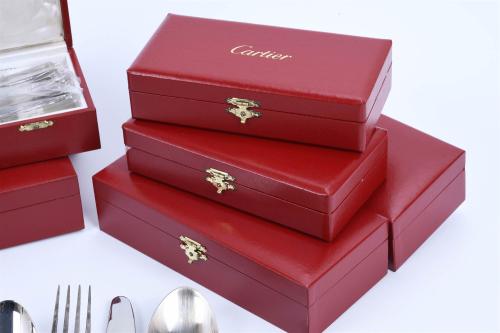 CARTIER. TWELVE-SERVICE CUTLERY SET, "LA MAISON DE LOUIS CA