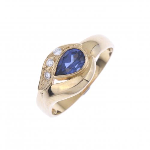 YELLOW GOLD RING WITH TANZANITE AND DIAMONDS.